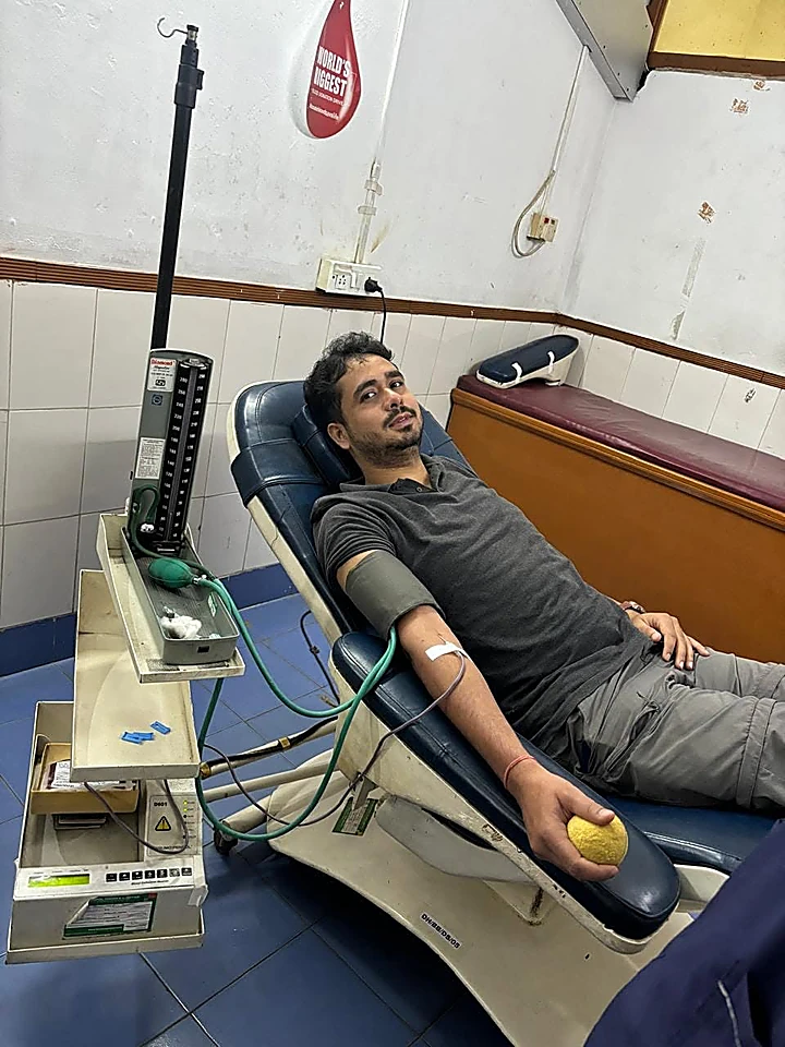 A donor giving blood at a hospital blood donation unit